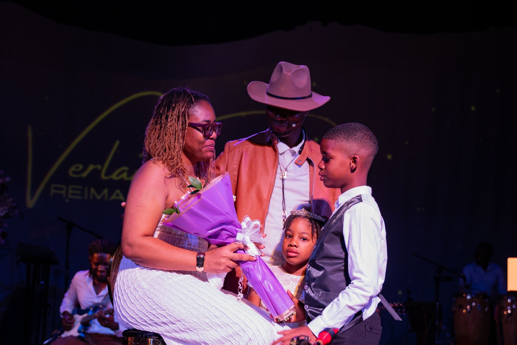 Verlando with family on stage